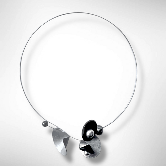 VOLUME 3 Multi-Directional Amplification Cones are at the Center of this Necklace from the SOUND Collection with Recycled Record Vinyl and Simulated Pearls