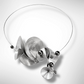DECIBEL 1 Crank up the volume with this multi sided Statement Necklace from the SOUND Collection with Simulated Pearls