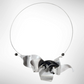 PULSE 1 Feel the Pulsating Sound Waves in this Bold Contemporary Necklace from the SOUND Collection with Recycled Record Vinyl and Simulated Pearls