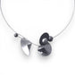 VOLUME 3 Multi-Directional Amplification Cones are at the Center of this Necklace from the SOUND Collection with Recycled Record Vinyl and Simulated Pearls