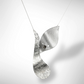 COVE Moving Wave Ocean Inspired Contemporary Necklace on Sterling Chain from the WATER Collection