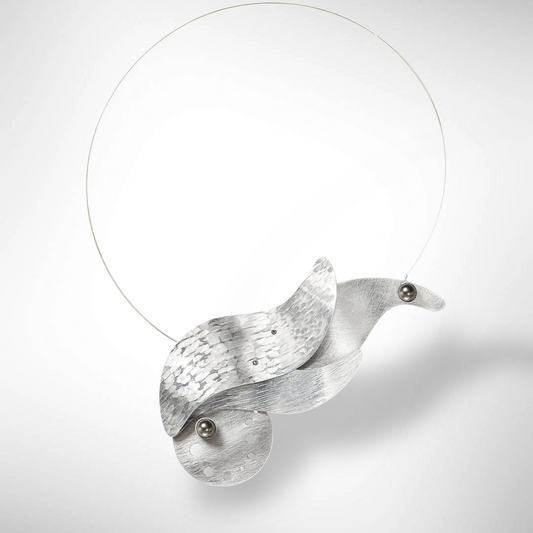 EDDY Smaller version of our SURF necklace featuring flowing waves and sea foam design with front clasp from the WATER Collection